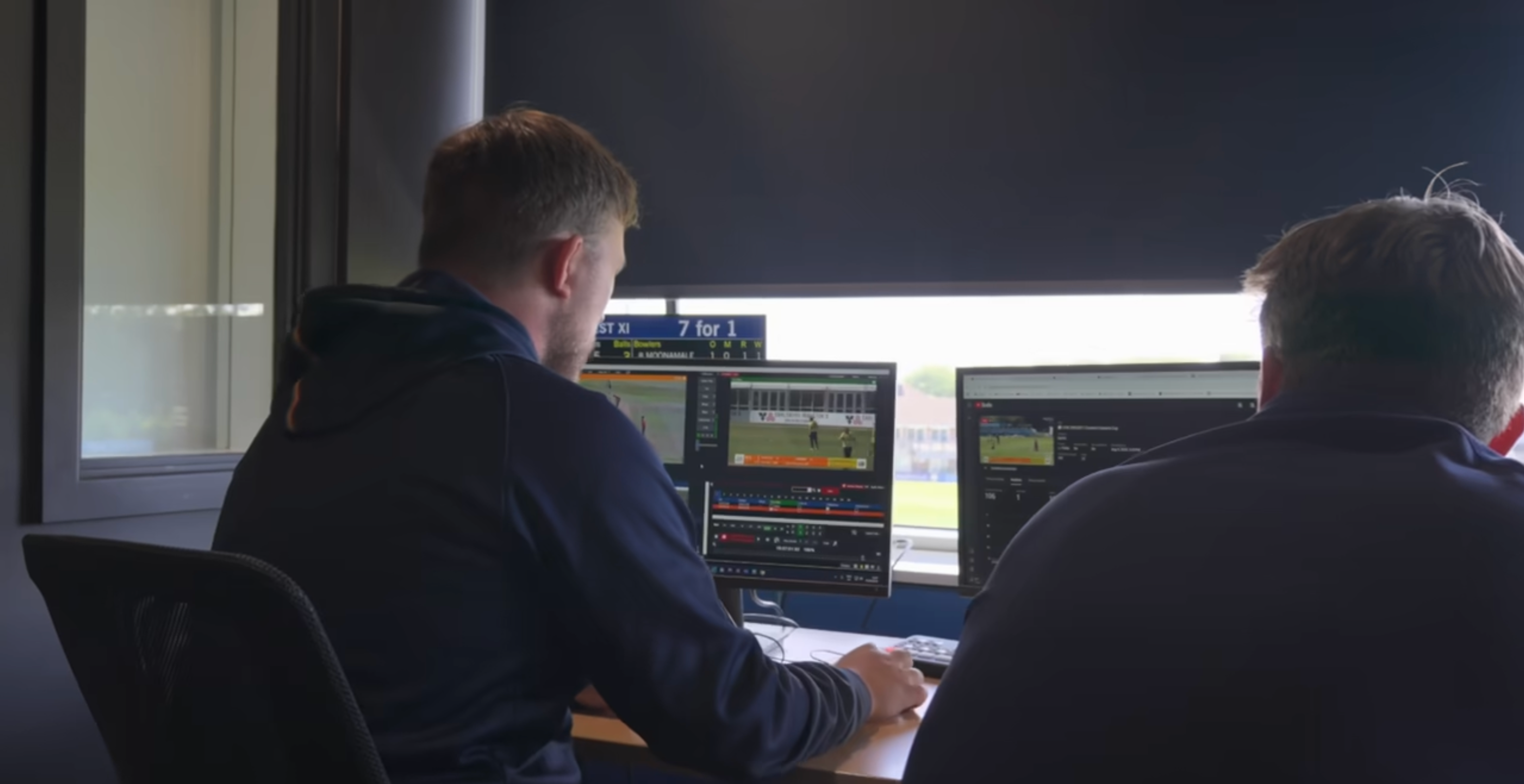 Two match day operators in the control room live streaming a cricket match